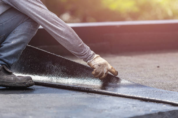 Professional Basement Waterproofing technician working in Hampstead, MD